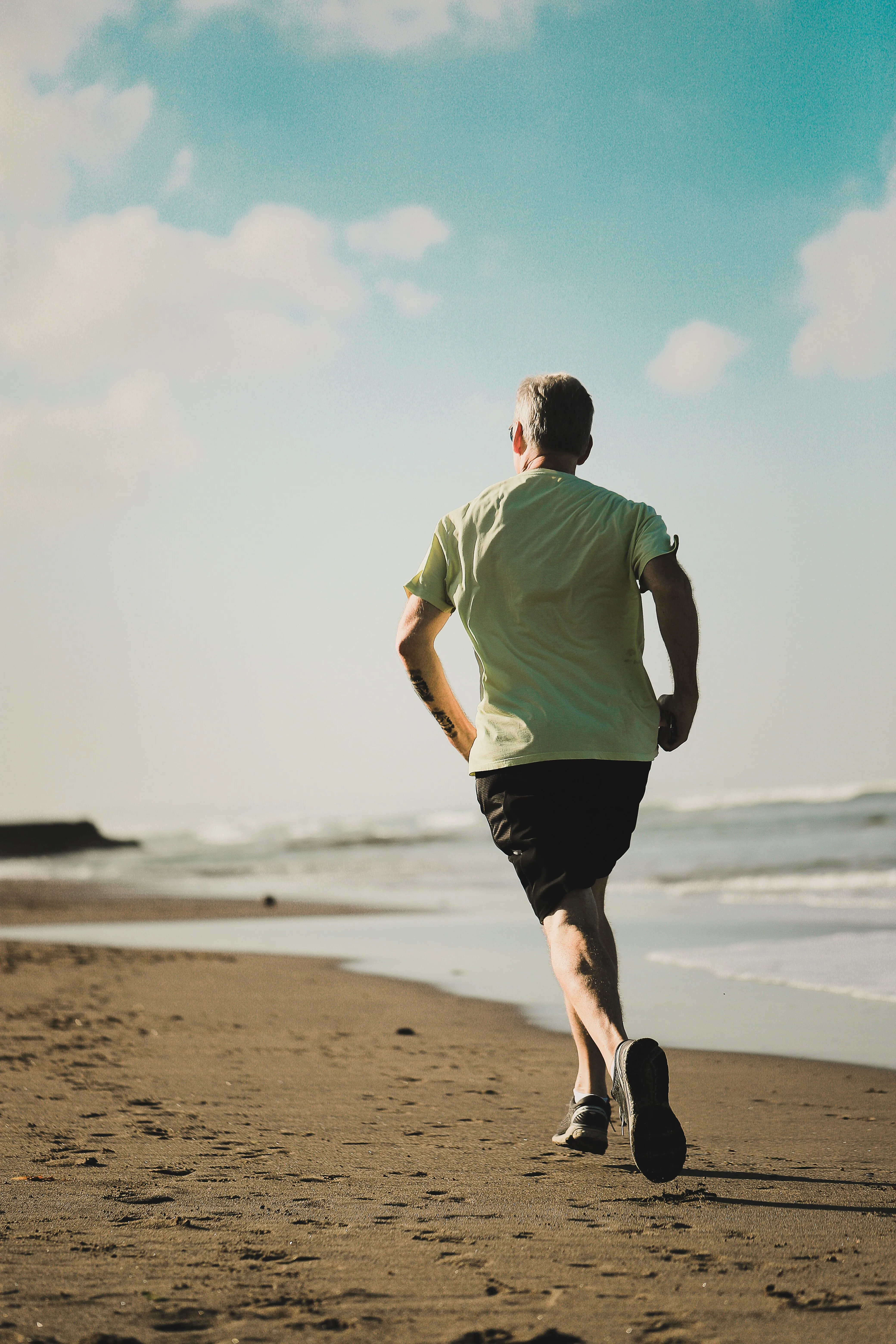 Man running beach